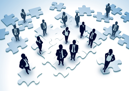 people standing on puzzle pieces