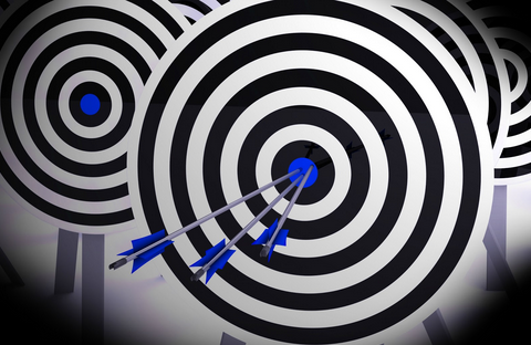target board with arrows in bullseye