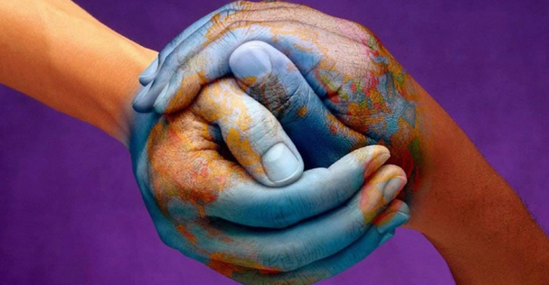 hands connecting with blue paint on them