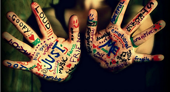 hands with artwork all over