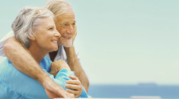elderly couple smiling together