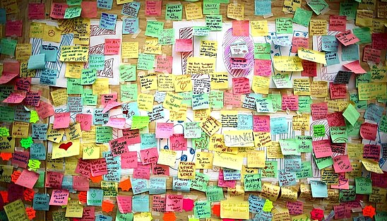 wall full of multi colored sticky notes