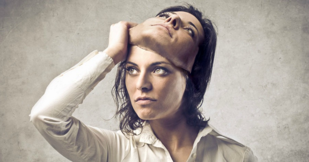 woman pulling her own face as a mask off