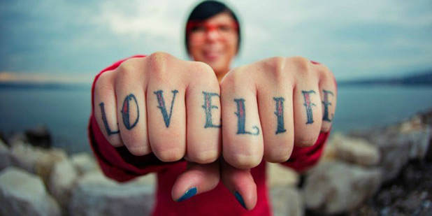 love life tattoo on woman