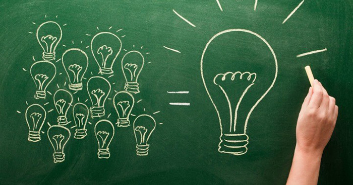 lightbulbs drawn on a chalk board